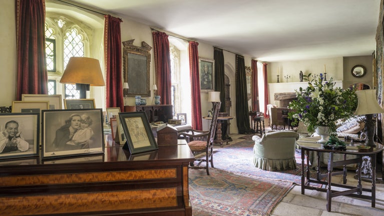 The Garden hall decorated in reds and greens